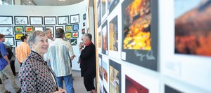 Shirlee Finney looks at the art in the new gallery named after her late husband, Jack Finney, at Steamboat Springs High School. The gallery officially opened Friday evening with a ribbon-cutting ceremony and the start of a new student art show.