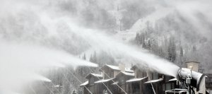 Snow guns fire at the base of Steamboat Ski Area on Sunday morning as a winter storm moves through the area. The recent snowstorm and colder temperatures have allowed the ski area to resume snowmaking after a warm, dry week.