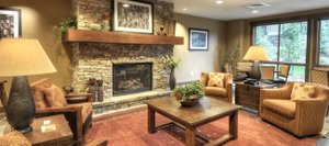 The lobby of Trailhead Lodge has a reception desk and gathering area for guests. The remaining 30 unsold condominiums, most of them one- and two-bedrooms, go to auction for the second time Dec. 15.