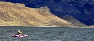 Dave Solawetz fishes for trout Sunday afternoon from his pontoon boat in Stagecoach Reservoir. With daytime highs expected to continue approaching 50 degrees each day this week, the weather forecast for the Yampa Valley is more favorable to bikers and anglers than skiers hoping to make turns in natural snow.