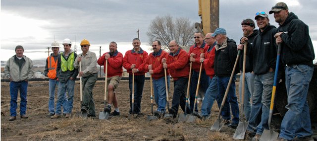 On Wednesday the Craig Rural Fire Protection District Board hosted a ceremonial ground breaking with local contractors and city officials at its live fire training site on Industrial Ave. behind Kmart.
Pictured from left are: Craig City Manager Jim Ferree; Jared Hume and Robert Murray of Anson Excavating & Pipe, Inc.; Don Williams of DNT Electric; Byron Willems, Tony Maneotis, Chief Bill Johnston, Chris Nichols, Alan Webber and John Forgay of the Craig Rural Fire Protection District; City of Craig Mayor Terry Carwile; and Jarrod Ogden, Clancey Comisky, and Sean Stacy of Three Son’s Construction.