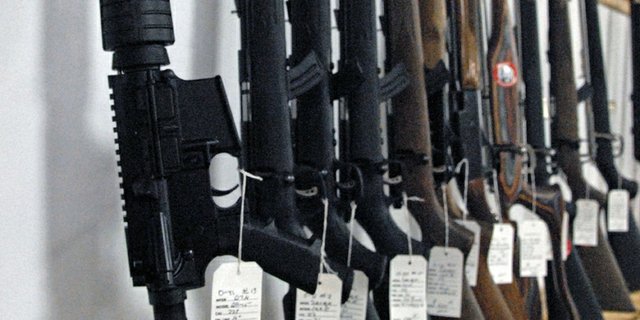 This Daltron AR-15, foreground, features standard issue U.S. Military specifications including, .223 calibre, 16-inch barrel and magazine capacities ranging from five to 30 rounds. If an assault weapons ban is passed by the Colorado General Assembly or by Congress, the AR-15 would likely be among the list of restricted firearms.