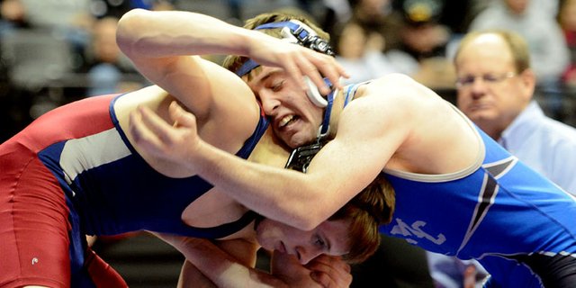 Moffat County’s Brayden Peterson battles The Classical Academy’s Andrew Register in their opening round match in the 138-pound class. Peterson lost, 10-7. Freshman Issik Herod also lost his opening-round match, falling to Alamosa’s Neff Malouff, while junior Jesse DeMoor was the lone Bulldog to post a win in the first round.