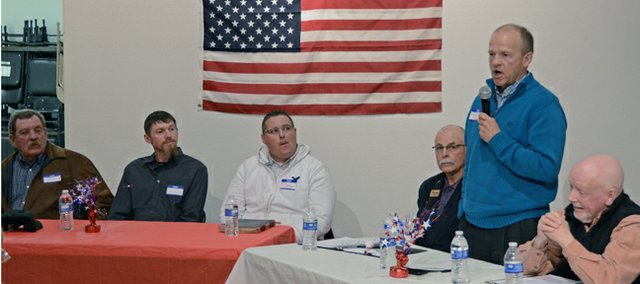 Craig City Council member Gene Bilodeau, standing, addresses more than 30 voters Thursday during a municipal candidate forum hosted by the Bears Ears Tea Party Patriots at the Center of Craig, 601 Yampa Ave. Also attending the forum were, from left, city council candidates John Smith, Jarrod Ogden and Tony Bohrer; and Craig City Mayor candidates Ray Beck and Terry Carwile.