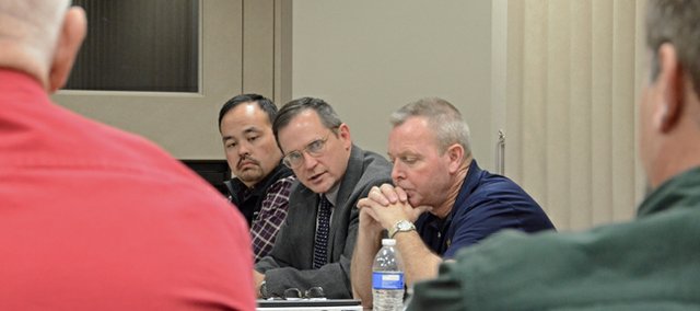 Brett Barkey, center, 14th Judicial District Attorney, talks about Craig and Moffat County's lack of mental health resources during a critical incident response meeting Thursday at the Moffat County Public Safety Center. Barkey was one of 19 officials representing a variety of local and state emergency response agencies who discussed Craig and Moffat County's preparedness to respond to and recover from a natural disaster or mass tragedy.