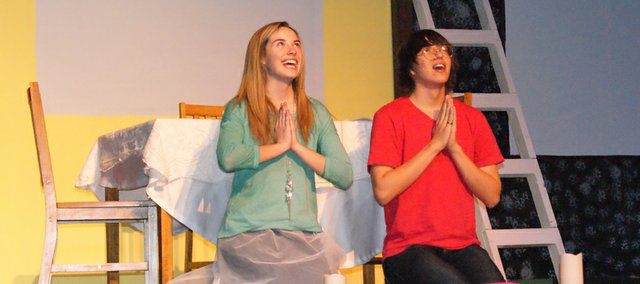 Caitlin Harjes and Travis Johnson rehearse for the Moffat County High School spring play, "Fools," by Neil Simon.
“Fools” follows the funny and sometimes frustrating plight of young schoolteacher Leon Tolchinsky, played by senior Gaven Spears. Tolchinsky attempts to break a 200-year-old curse of stupidity cast upon the village of Kulyenchikev in order to be with the woman he loves, Sophia.