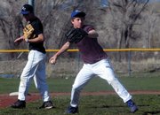 Moffat County High School sophomore Jasen Kettle, right, and fellow shortstop Dylon Camilletti work on infield drills at practice Wednesday. This is the first week the baseball team has been outside for three consecutive days.