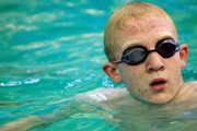 MCHS sophomore Charlie Griffiths rests between intervals at swim practice Thursday. Griffiths and the Bulldogs return to competition today and Saturday at the Jeffco Invitational in Denver after being on a break for the past several weeks.