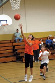 Kody Fief shoots a layup during Thursday night’s Craig Parks and Recreation youth basketball game at Sandrock Elementary School. Fief’s team, the Craig Hoosiers, won the game, 30-12, against Hayden.