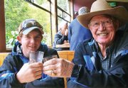 Wesley Chapman, 15, on left, cheers his grandfather, Melvin Norman, 70, during a trip to New Zealand.