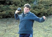 Moffat County High School Senior Jeremiah Gordon throws the shot put Monday during MCHS track and field practice. Competing Saturday at West Grand High School, Gordon won the discus competition by throwing 120 feet.