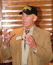 Bob McConnell speaks at a reception for delegates to the Republican county assembly at Creekside Cafe & Grill on Monday evening.