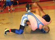 Charlie Griffiths, front, tackles his opponent during the June 16 to 20 wrestling camp in Gunnison. Griffiths, who will be entering his senior year at Moffat County High School, went 17-0 during the tournament.