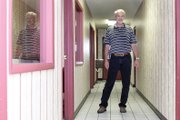 John Knoche, sales manager, stands in the hallway Friday at Cook Chevrolet. Originally from Washington, D.C., Knoche has lived in Craig since 1971.