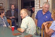 Moffat County Commission, District 3, candidates Frank Moe, second from left, and Tom Mathers, second from right, visit with community members Tuesday evening at the Moffat County Courthouse while awaiting primary election results. Pictured, from left, are Vicki Duncan, Moe, Gene Bilodeau, Moffat County coroner candidate Larry Dalton, Mathers, and Gail Severson.