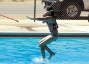 Alyssa Chavez, 9, jumps into the pool Wednesday at the Craig Swimming Complex. The pool is scheduled to close to the public Sunday.