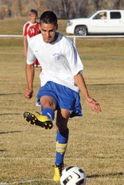Moffat County soccer player Tracy Mendoza drives in his final goal of the regular season during Moffat County High School’s home game against Steamboat Springs. Mendoza was the team’s leading scorer, finishing the year with 30 goals.
