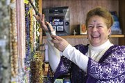 Craig resident Sharon Miller, 66, stands Thursday in her store, Crystal Sanctuary, which specializes in beads, fossils, crystals, fossils and readings. Miller, who has lived in Craig for about two years, said she wants the store to be a calm place of learning and healing for people in the community.