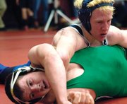 Moffat County senior Charlie Griffiths controls Delta’s Dylon Taylor in the third period of their match on Friday at the Warrior Classic in Grand Junction. Griffiths won the match by decision 9-3.