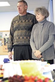 John Boyd, Colorado Northwestern Community College president, stands by his wife, Betty, during a farewell reception Tuesday. Boyd is leaving CNCC this week. Russell George, former speaker of the Colorado House, has been named as a finalist for the position. George will be visiting Craig for a community meeting later this month.