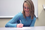 Maddy Jourgensen, a Moffat County High School senior, inked her letter of intent Wednesday to attend Augustana College in Sioux, S.D. Jourgensen said Augustana’s academic and running programs put the school at the top of her list.