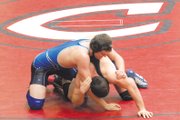 Cody Adams, a Moffat County High School senior, looks to roll his opponent Saturday in the 189-pound weight class in the 4A western regional tournament. Adams finished fourth and will make his second trip to the 4A state meet.