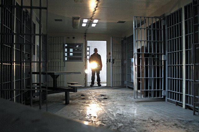 Moffat County Planner Jerry Hoberg stands Monday in a doorway leading to holding cells in the old Moffat County Jail behind the Moffat County Courthouse. The Moffat County Commission has begun the process of demolishing the old jail, which was vacated when the Moffat County Public Safety Center was opened in 2001.