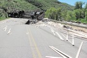 Lumber lies scattered Wednesday across Colorado Highway 13 after a single-vehicle crash south of Craig. Neither speed, drugs nor alcohol were factors, the Colorado State Patrol reported.