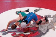 Ashlee Griffiths, an incoming Moffat County High School freshman, tries to turn her opponent during a wrestling camp June 15 to 19 in Gunnison. MCHS wrestling coach Roman Gutierrez said offseason workouts help keep the rust off and keep wrestlers in shape.