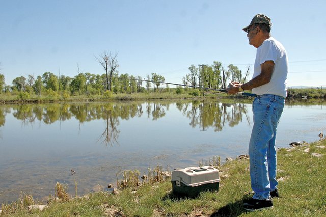 Joe Archuleta, 71, fishes in the pond Wednesday at Loudy-Simpson Park. Craig was recently ranked 77th in Outdoor Life magazine’s fourth annual rankings of the top 200 towns for sportsmen. Archuleta, a Craig resident, said he tries to make it to Loudy-Simpson at least once a week to enjoy the outdoors.