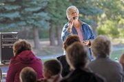 Craig singer Loretta Earle performs a country gospel song during Cowboy Church at the Moffat County Fairgrounds.
