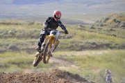 Wesley Chapman, of Craig, comes over a hill Sunday at Thunder Ridge Motorsports Park during the park’s third motocross races of the year. Chapman took second in the 250-amateur class and first in the adult beginner class.