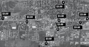 An aerial view of Craig, with gas prices noted for a gallon of unleaded gas. See text for names of the gas stations.