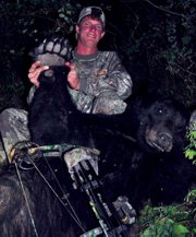 Rick Sanny with his prize bear, which took first place from the Colorado Bow Hunter Association in 2010.