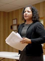 Marcela Rivera, post office review coordinator for the Colorado/Wyoming District, addresses residents Tuesday at the Hamilton Community Center. Rivera said the Hamilton post office is one of 3,563 branches nationwide being considered for closure.