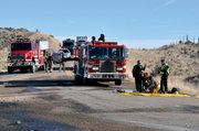 Emergency response crews gather at the site of a tractor-trailer crash Thursday morning near Colowyo Mine. Officials from the Colorado State Patrol, Moffat County Sheriff’s Office, State Patrol Hazmat Team, The Memorial Hospital ambulance service, Craig Fire/Rescue and the Moffat County Hazmat Team responded to the one-vehicle wreck.