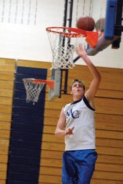 Jacob Scroggs, a Moffat County High School senior, tips a ball up during a practice Nov. 14 at MCHS. Scroggs and fellow seniors Andy Browning, Colby Haddan and Braeden Sullivan will lead the MCHS boys varsity basketball team under new head coach Eric Hamilton.