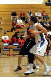 Andy Browning, a Moffat County High School senior, looks to go up with the ball Jan. 13 against Eagle Valley at MCHS. The MCHS boy varsity basketball team will get a chance to avenge a 65-47 loss in the first game today at Eagle Valley.