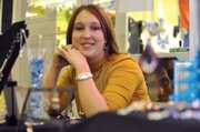 Kirstie McPherson, an 18-year-old Craig resident, mans her booth Dec. 9 at Centennial Mall’s Holiday Craft Show. In addition to participating in numerous high school groups, McPherson also owns her own business, Sage Country Jewelry.