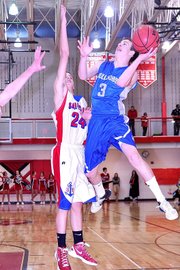 Moffat County's Joe Camilletti shoots over Steamboat Springs Zach Dunklin in the first half of Friday night's game against the Sailors in Steamboat Springs.