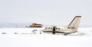 A snowplow clears the runaway Monday morning at Yampa Valley Regional Airport, where a private plane bound to Hayden from Texas crashed in a snowstorm Sunday.