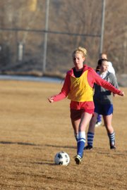 Bailey Hellander, a Moffat County High School junior, looks to clear the ball out of the defensive zone March 7 outside MCHS. The MCHS girls varsity soccer team has won five games each of the past two seasons, tying a school record, and the Bulldogs will look to make a push for the playoffs this season.