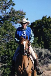Craig resident Ken Wolgram gallops atop his horse, Awesomes Fire N Ice, during a North American Trail Ride Conference competition in Evergreen. The team participated in 12 NATRC events in 2011, and for the first time in the organization’s history, took home all four national trophies.