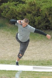 Moffat County High School senior Garrett Spears prepares to throw during the men’s shotput at the Clint Wells Invitational Friday at Moffat County High School Track. Spears’ throw of 48 feet, 9.25 inches won the event