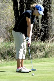 Moffat County High School sophomore Caitlin Harjes practices her putts at the Yampa Valley Golf Course. Harjes and senior Sam Fox represented the MCHS girls varsity golf team Monday and Tuesday at the 4A state championships. Fox placed 59th while Harjes finished 70th.