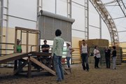 Nine Yampa Valley residents toured the horse arena belonging to Dr. Scott and Connie Sue Ellis on Sunday night east of downtown Craig. The group is exploring ways to develop a therapeutic horse riding center in town.