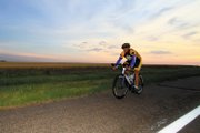 Greg Crawford , University of Notre Dame Dean of the College of Science, rides his bike earlier this month during a cross-country trek. Crawford is riding from Boston, Mass., to Pebble Beach, Calif., to help raise money for research on the disease Niemann-Pick Type C. He came through Craig Tuesday.