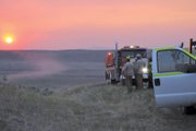Emergency responders keep a close lookout over the Colowyo Fire on Saturday near Colowyo Coal Co. as the sun sets. Craig Fire/Rescue, the Moffat County Sheriff’s Office, The Memorial Hospital EMS and Colowyo employees responded to the blaze.