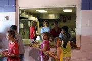 Staff at the Boys & Girls Club of Craig serve the free meal offered by the club, 1324 E. U.S. Highway 40, Thursday. The meal, along with a nutritious snack, is served every weekday during the summer through Aug. 17. Unit director Kim Maneotis said the meal is available to any child younger than age 18, even if they are not club members.
