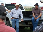 John Salazar, left, state agriculture commissioner, and T. Wright Dickinson listen to a presentation at Pankey Ranch as part of a drought tour Salazar and other state officials, including Hayden resident Al White, went on Tuesday in the Yampa Valley. The tour stopped at ranches near Craig, Hayden and Steamboat Springs.